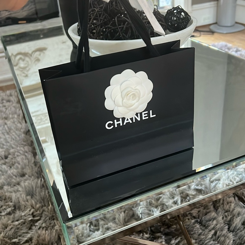 CHANEL Black Tote with White Floral Design